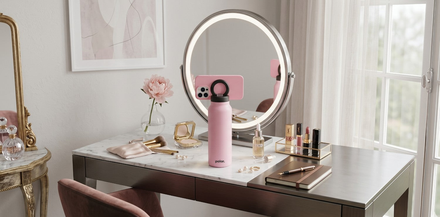 Bloom magnetic water bottle phone mount used as a tripod for hands-free filming at a vanity