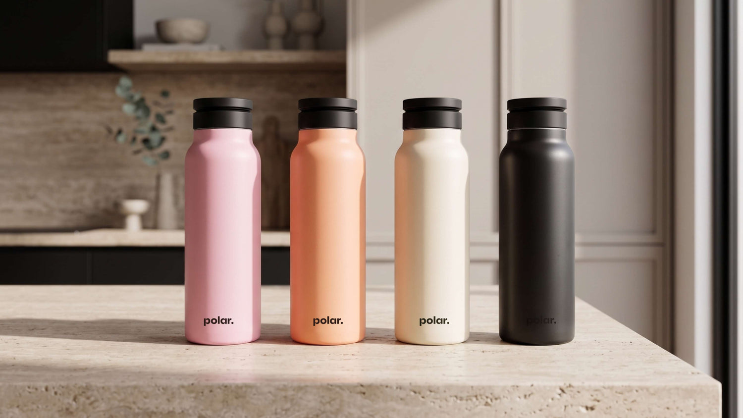 Magnetic water bottle with phone holder in four colourways styled for modern kitchen and everyday living