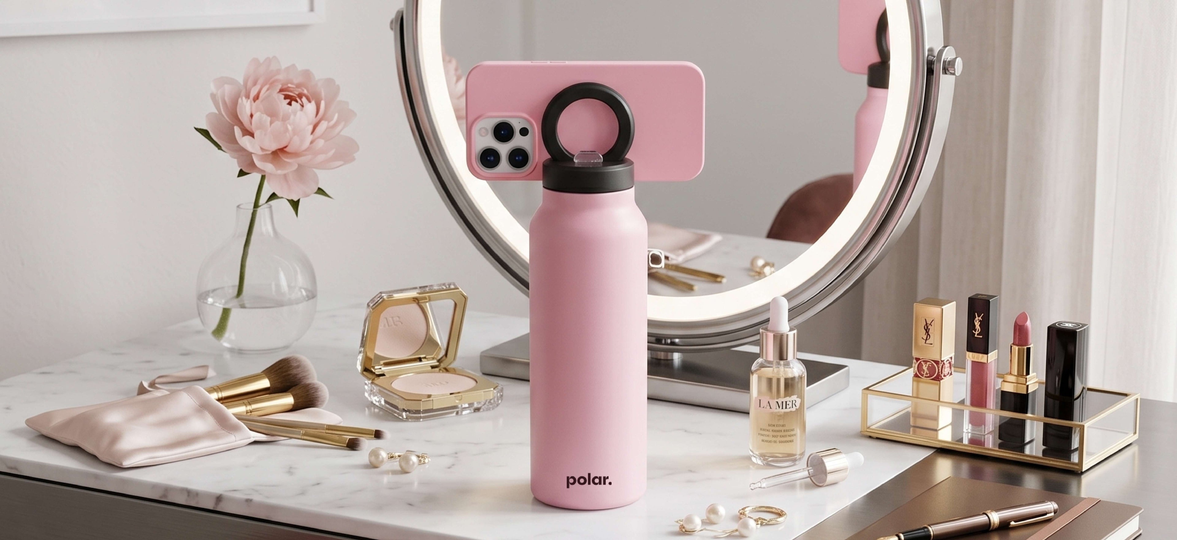 Bloom magnetic water bottle phone mount used as a tripod for hands-free filming at a vanity makeup setup