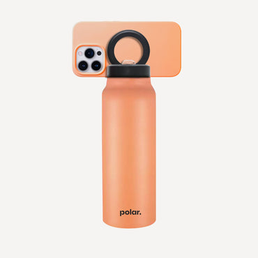 Sundust magnetic water bottle with phone holder used as a tripod for filming, workouts and everyday use
